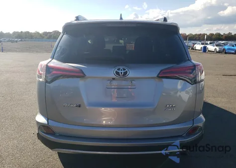 2018 Toyota Rav4 Adventure from USA, damaged, VIN JTMRFREV5JD228634